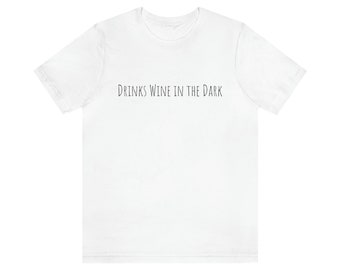 Drinks Wine in the Dark