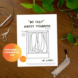 May include: A printable pattern for a "No Feet" Ghost Polaroid stained glass project. The pattern is for hobby and commercial use. The pattern shows two ghost figures with 18 pieces total.