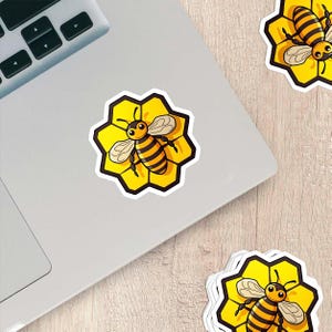 Cartoon Bee in Honeycomb Sticker – Weatherproof Vinyl for Laptops, Cups & Cars