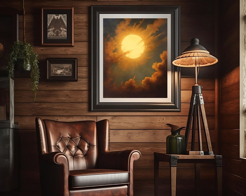 May include: A brown leather armchair with a tufted back and seat sits in a room with wood paneling. A framed painting of a sun shining through clouds hangs on the wall above the chair. A floor lamp with a black shade stands next to a small wooden table.