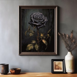 May include: A framed print of a dark blue rose with a gold stem and leaves against a dark green background.