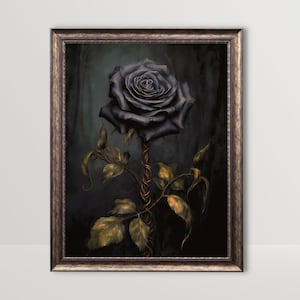 May include: A single black rose with gold-colored thorns and leaves against a dark green background. The rose is framed in a gold-colored frame.