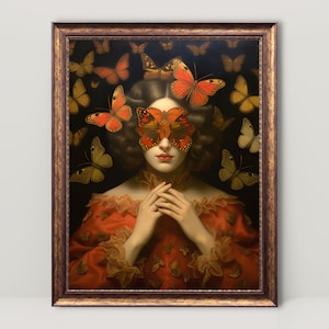 May include: A framed artwork featuring a woman with a butterfly mask and a red dress, surrounded by butterflies. The artwork has a dark background and a gold-colored frame, creating a vintage aesthetic.