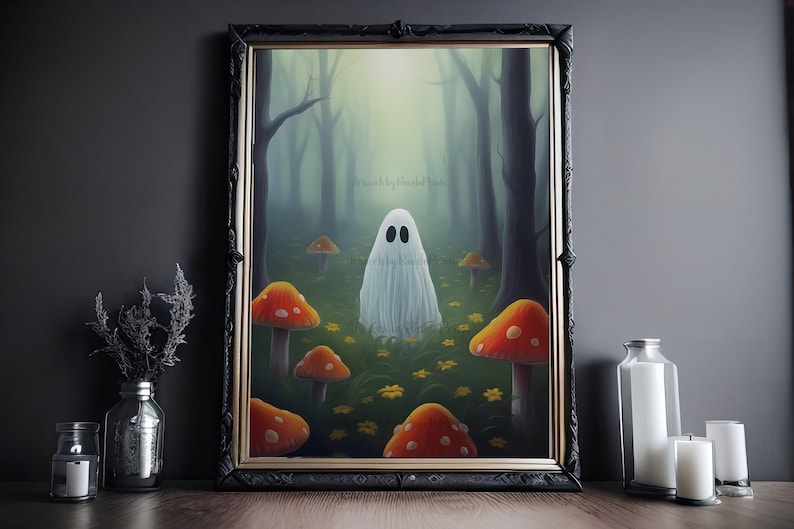 May include: A framed painting of a white ghost standing in a forest with red and orange mushrooms and yellow flowers. The text "A ghost by Rachel Rose" is written in the top center of the painting.