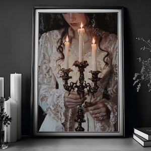 May include: A woman in a white lace dress holds a candelabra with three lit candles. The candles are dripping wax and the candelabra is ornate with a dark brown finish.