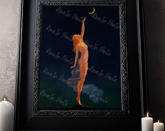 May include: A framed vintage art print of a woman reaching up to a crescent moon in a starry night sky. The woman is wearing a flowing gown and has long, flowing hair. The print is in a black frame with a decorative border.