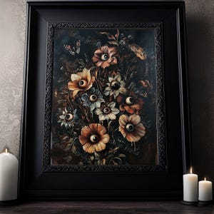 Image is of a gothic ornate frame surrounded by candles. In the frame is a surreal painting of a bouquet of flowers with eye balls. The painting is dark and moody. For gothic home decor and Halloween wall art
