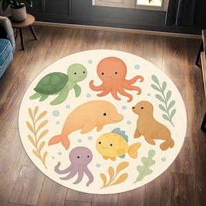 Tappeto rotondo con animali marini – Simpatici amici dell'oceano con delfini, polpi, tartarughe, foche e pesci per la cameretta dei bambini o per decorare il pavimento della cameretta.