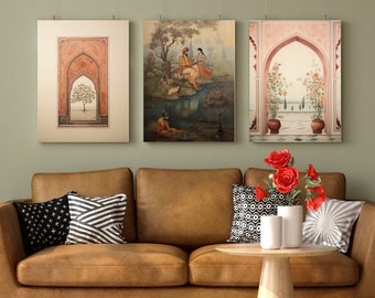 May include: Three framed prints with a brown leather sofa, two black and white patterned pillows, and a wooden table with a vase of red roses. The prints feature traditional Indian architecture and scenes.