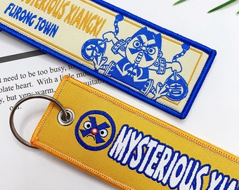 Gepersonaliseerde geborduurde patches: sleutelhangers met logo