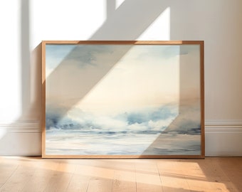 May include: A framed watercolor painting of a seascape with blue and white waves crashing on the shore. The painting is set against a light blue and white sky with a hint of yellow.