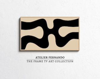 May include: Abstract art print featuring a beige background with a black, flowing, organic design. The artwork is framed in a light brown wooden frame. The text "ATELIER FERNANDO THE FRAME TV ART COLLECTION" is below the artwork.