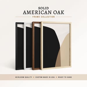 May include: Four rectangular frames from the Solid American Oak Frame Collection, displayed in black, white, dark brown, and natural light wood finishes. Each frame contains an abstract print with black, beige, and white curved shapes.