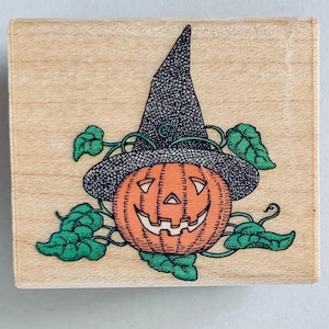 Sello de goma vintage de calabaza y bruja de Halloween