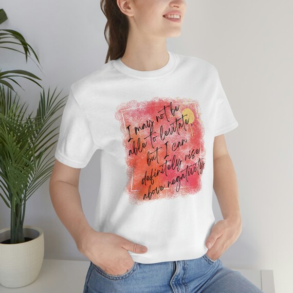 I may not be able to levitate, but I can definitely rise above negativity Unisex Jersey Short Sleeve Tee