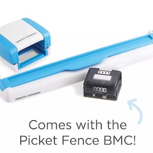 May include: A blue and white plastic tool with the text "Creative Memories" on it. The tool is used to punch out shapes from paper. The tool comes with a black plastic punch that has the text "0000" on it. The punch is labeled "Picket Fence BMC!"