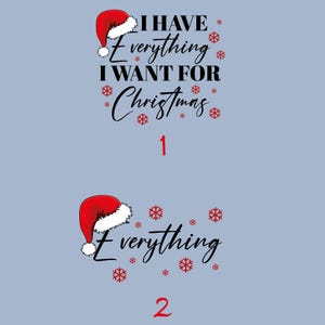 May include: A light blue background with two Christmas-themed designs. The first design features a Santa hat and the text "I HAVE EVERYTHING I WANT FOR Christmas" with red snowflakes. The second design has a Santa hat and the word "Everything" with red snowflakes.