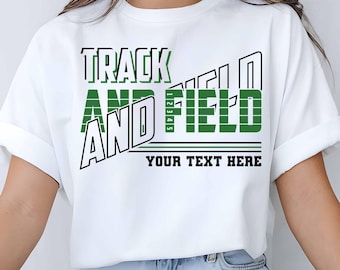 May include: White t-shirt with a black and green graphic design that says "TRACK AND FIELD" with the text "YOUR TEXT HERE" underneath.