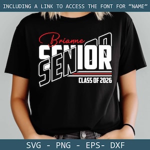 May include: Black t-shirt with white text that says "SENIOR" in a bold, layered font. The text "Brianne" is written in red cursive above the word "SENIOR". Below the word "SENIOR" is the text "CLASS OF 2026" in white.
