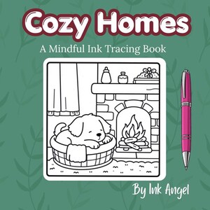 May include: A book titled Cozy Homes: A Mindful Ink Tracing Book by Ink Angel, featuring a black and white line art illustration of a puppy sleeping in a basket by a fireplace, accompanied by a pink ballpoint pen on a green background.