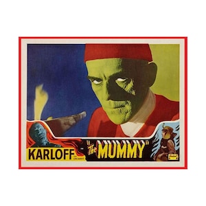 Könnte beinhalten: Vintage-Filmplakat für "Die Mumie" mit einer grünhäutigen Figur in einem roten Fez. Das Plakat hat einen roten Rand und enthält den Namen "Karloff" und den Filmtitel.