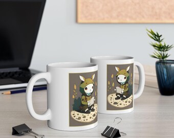 Young Jackalope reading 11oz Ceramic Mug: mythical creature