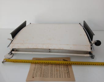 Buscher Vintage Emaille Persdroger Fotodroger In goede staat zoals te zien op de foto's en in werkende staat.