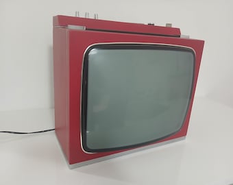 Televisor vintage SELECO ZIRCONIO rojo, diseño de los años 70 estilo era espacial. En excelente estado, como se muestra en las fotos. No funciona.