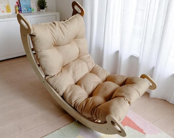 Stylish Wood Rocker with Soft Cushion for Kids: Comfortable Seating for Toddlers, Great for Quiet Time & Imaginative Play Space.