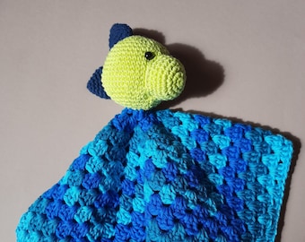 Crocheted baby comforter with dino