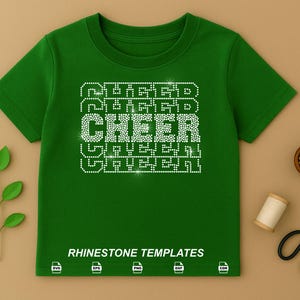 May include: A forest green short-sleeved t-shirt featuring a repeating graphic of the word CHEER spelled out in white rhinestones. The text RHINESTONE TEMPLATES appears at the bottom with five small file format icons: SVG, EPS, PNG, DXF, and CDR.