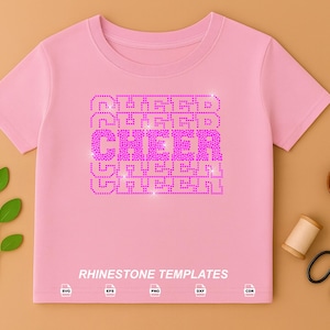 May include: A light pink short-sleeved t-shirt featuring the word CHEER repeated five times in a stacked, block-letter design made of bright pink rhinestones. The text RHINESTONE TEMPLATES appears at the bottom with five small file format icons.