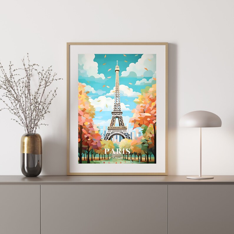 May include: A colorful illustration of the Eiffel Tower in Paris, France. The tower is surrounded by trees with fall foliage. The text "PARIS France" is at the bottom of the image.