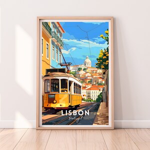 May include: A yellow tram travels down a street in Lisbon, Portugal. The tram is surrounded by colourful buildings and a blue sky with white clouds. The text "LISBON Portugal" is printed below the tram.