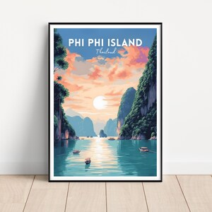 May include: A vintage travel poster featuring a scenic view of Phi Phi Island, Thailand. The poster depicts a turquoise bay surrounded by lush green cliffs and a vibrant sunset sky.