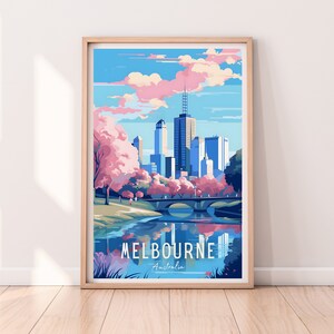 May include: A colorful illustration of the Melbourne skyline with a bridge and river in the foreground. The city is depicted with tall buildings and a blue sky with pink clouds. The text "MELBOURNE Australia" is at the bottom of the image.