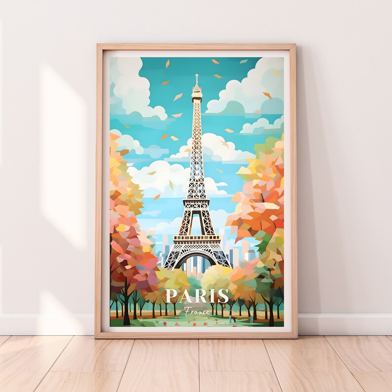 May include: A colorful illustration of the Eiffel Tower in Paris, France. The tower is surrounded by trees with fall foliage. The text "PARIS France" is at the bottom of the image.