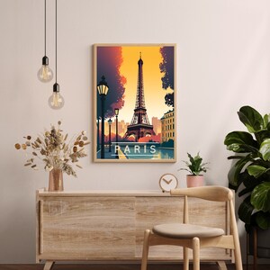 May include: A vintage-style poster featuring an illustration of the Eiffel Tower in Paris, France. The poster has a warm color palette with a sunset sky and a street scene in the foreground. The text "PARIS" is printed in white at the bottom of the poster.