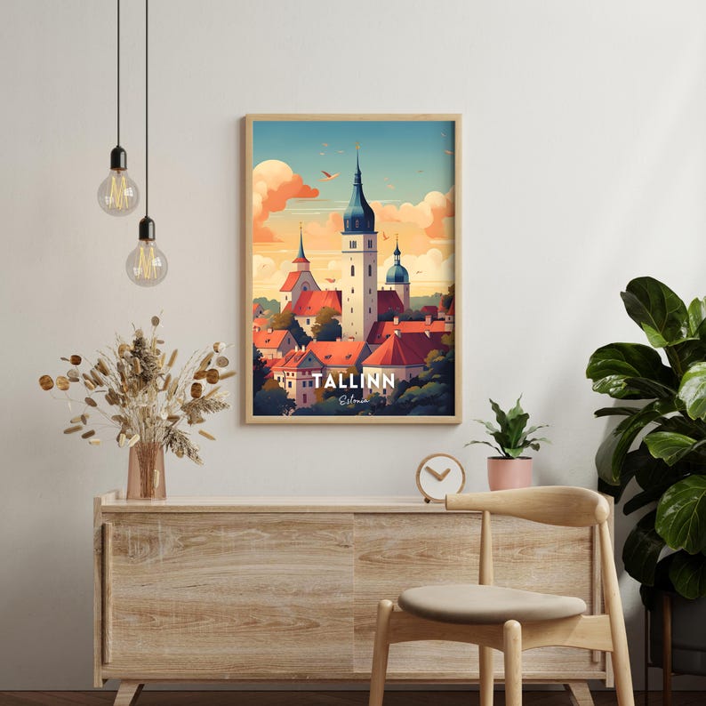 May include: A framed poster with a colorful illustration of the city of Tallinn, Estonia. The poster features a cityscape with buildings and a church steeple. The text "TALLINN, Estonia" is printed at the bottom of the poster.