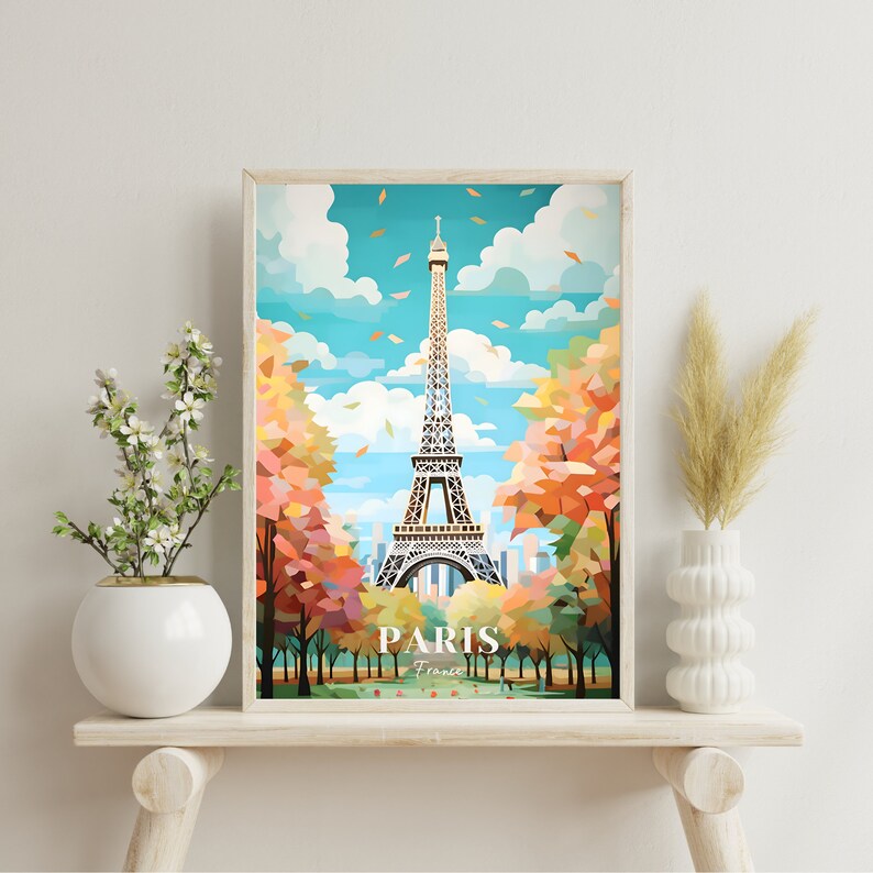 May include: A colorful illustration of the Eiffel Tower in Paris, France. The tower is surrounded by trees with fall foliage. The text "PARIS France" is at the bottom of the image.