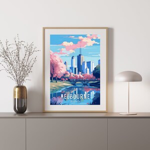 May include: A colorful illustration of the Melbourne skyline with a bridge and a river in the foreground. The city is depicted with tall buildings and a pink sky. The text "MELBOURNE Australia" is at the bottom of the image.