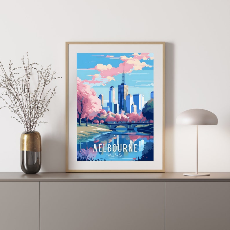 May include: A colorful illustration of the Melbourne skyline with a bridge and a river in the foreground. The city is depicted with tall buildings and a pink sky. The text "MELBOURNE Australia" is at the bottom of the image.