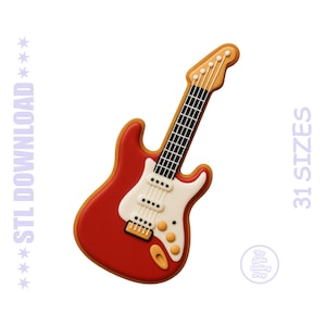 Peut inclure: Emporte-pièce en forme de guitare électrique rouge avec un pickguard blanc et une touche noire. Le découpoir a un contour marron clair et se trouve sur un fond blanc. Le texte à gauche indique "STL DOWNLOAD" et le texte à droite indique "31 SIZES".