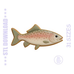 May include: A fish-shaped cookie cutter with a detailed design. The cookie cutter features a light brown outline, with a pink and white body, and green fins. The image also includes the text "STL DOWNLOAD" and "31 SIZES".