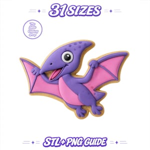 Peut inclure: Un biscuit en forme de ptérodactyle violet et rose avec un grand œil et la bouche ouverte. Le texte 31 SIZES et STL+PNG GUIDE apparaît en violet. Un logo circulaire avec le texte The Little Cutting Shop est visible en haut à gauche.