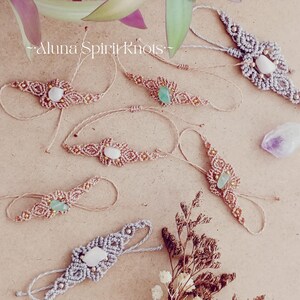 May include: Six macrame bracelets featuring knotted cord in beige and grey tones, each centered with a polished gemstone in white or green. The text Aluna Spirit Knots is visible. Small metallic beads are integrated into the intricate woven patterns.