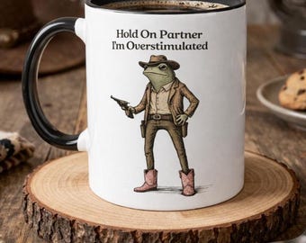 Frog Cowboy Mug – "Hold On Partner Im Overstimulated" Sarcastic Coffee Cup
