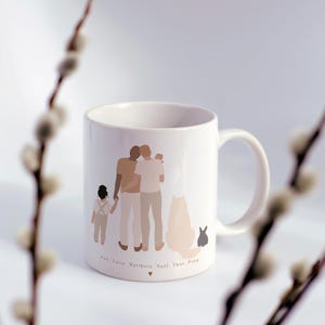 May include: White ceramic mug with a brown illustration of two people holding a child, a dog, and a rabbit. The text "Zoe, Luca, Matthew, Noel, Thor, Pips" is printed below the illustration.