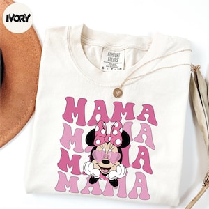 a white shirt with a minnie mouse on it