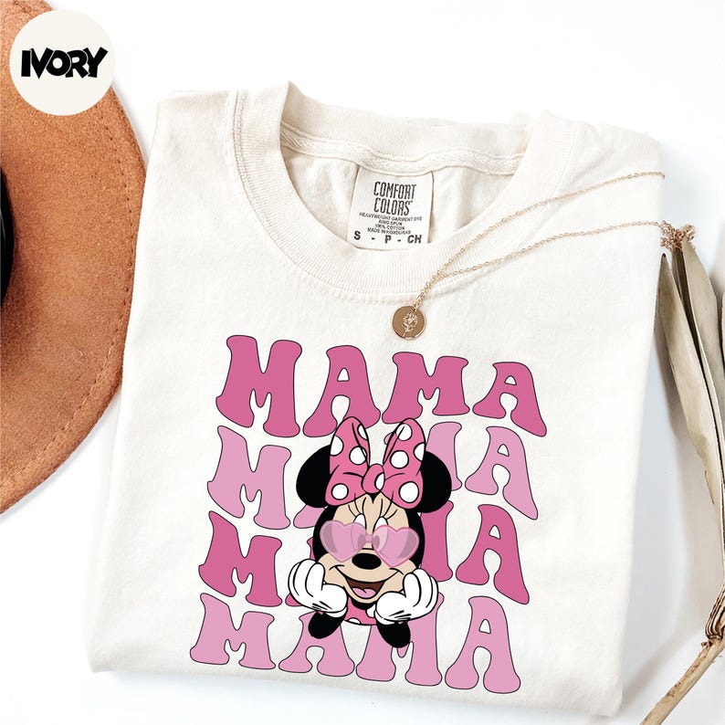 a white shirt with a minnie mouse on it